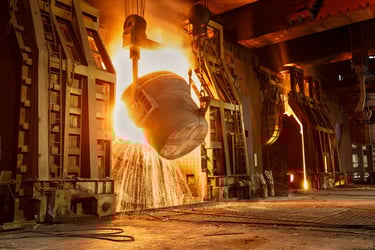 Combining molten elements in a furnace Combining molten elements in a furnace